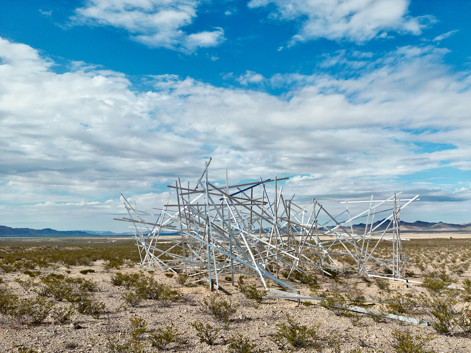 The completed Mile Quartered sculpture looking north beneath a broad sky