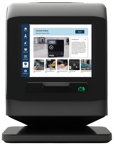 A black digital medication dispenser with the new tutorials screen.