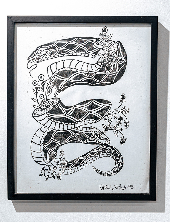 River Bend | Linoleum block print

Black and white snake segmented into five pieces with woodland-stylized floral patterns connecting each piece.