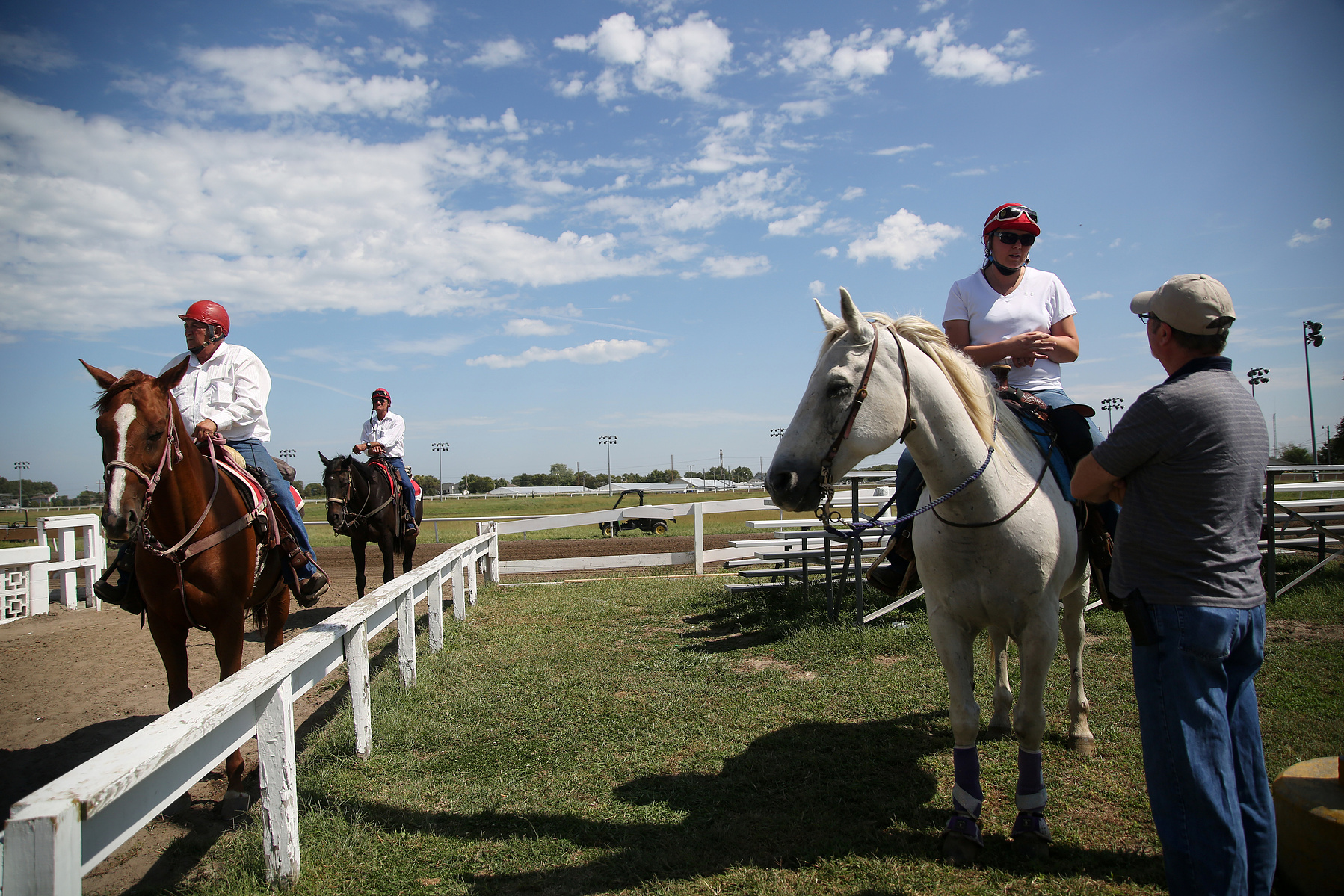 COLUMBUS, NEB - 9/6/2015 - Racetrack outriders are responsible for maintaining a safe environment during live races at AG Park. On race day the outriders lead the race horses onto the track for the post parade to the starting gate, then escort the jockeys