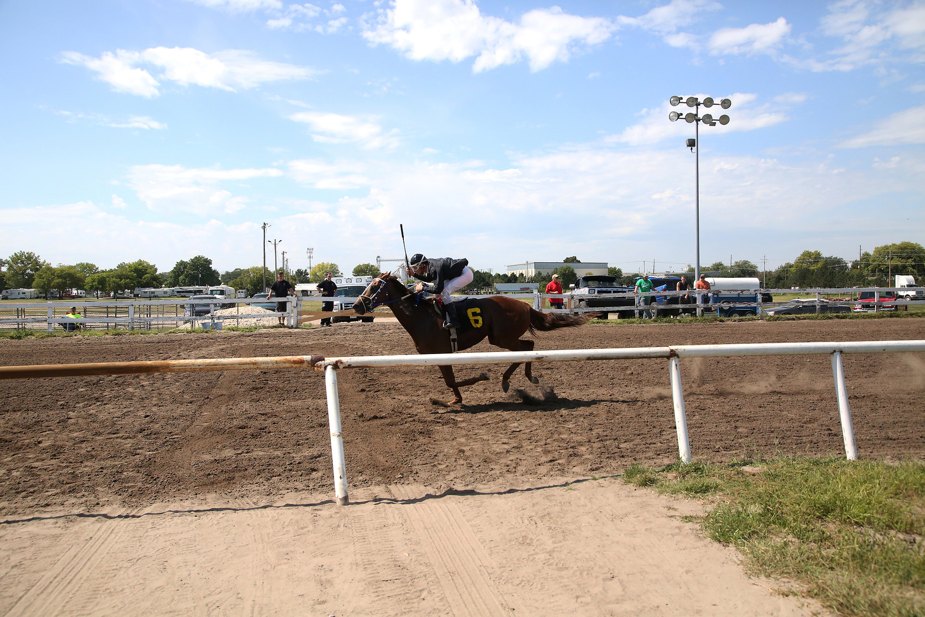 COLUMBUS, NEB - 9/6/2015 - Castana, horse lengths before its competitors on Saturday. As they round the last corner, the pair heads for the finish line to win the first race of the day at AG Park. JENNA VONHOFE/Lincoln Journal Star