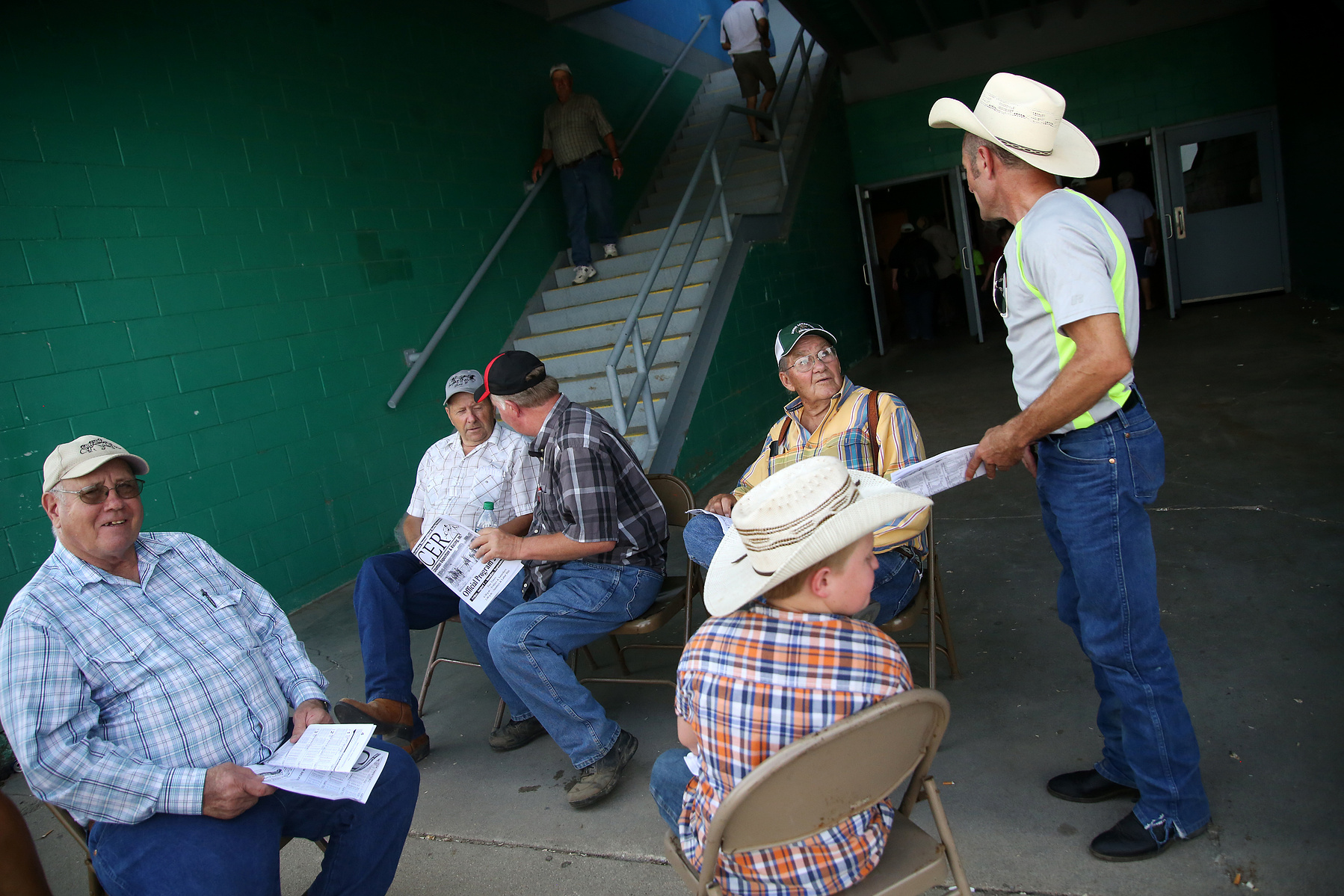COLUMBUS, NEB - 9/6/2015 - Horse racing culture young and old gathers together to assess the prospects in the upcoming races at AG Park. JENNA VONHOFE/Lincoln Journal Star