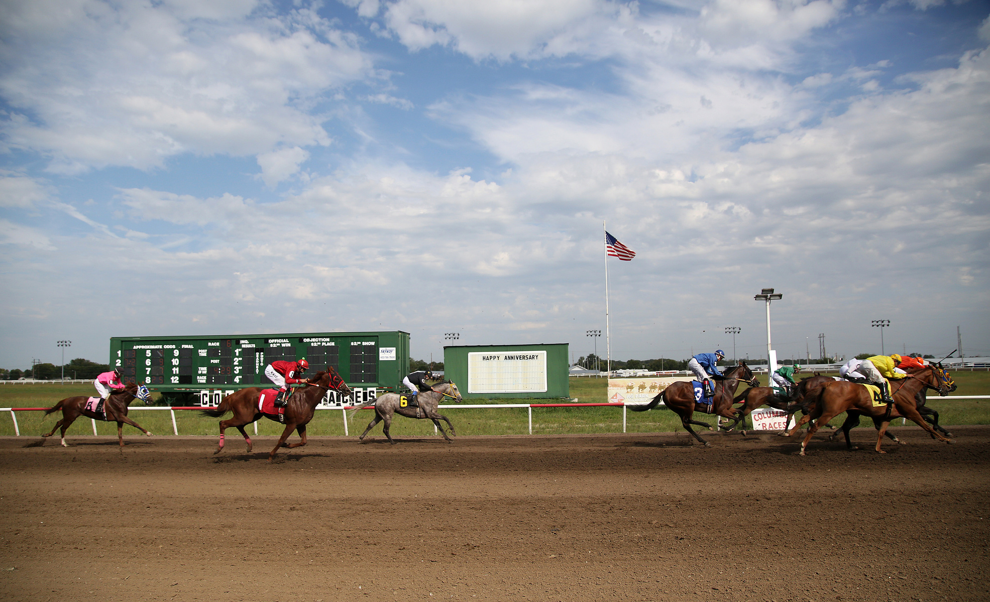 COLUMBUS, NEB - 9/6/2015 - The sixth race of the day is a photo finish with the officials reviewing the footage from the end of the race at AG Park on Saturday, September 6, 2015. JENNA VONHOFE/Lincoln Journal Star