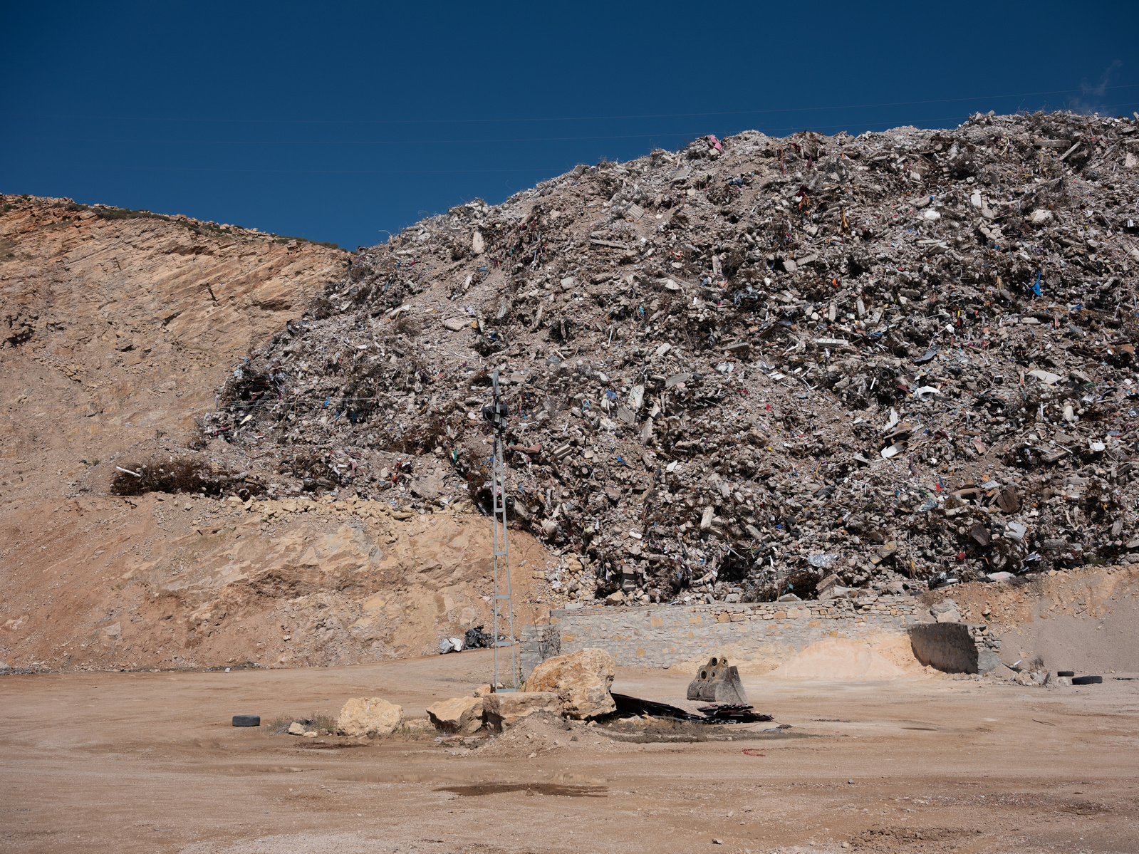 Vast mountains of rubble are piling up in the countryside near Antakya, where the collapsed and damaged buildings are being cleared. The dumps are known to contain asbestos, along with all other household items, and possibly even the bodies of those crush