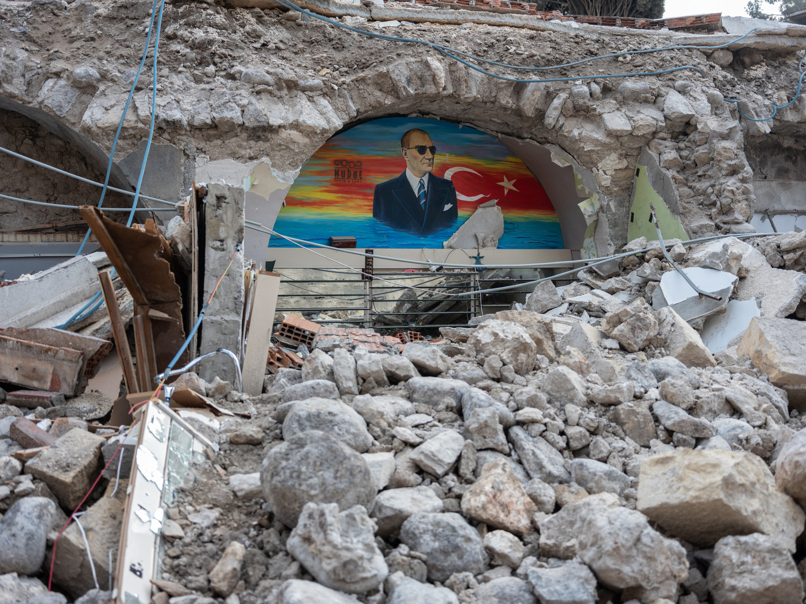 A painted image of Turkey’s founding father Mustafa Kemal Ataturk, on the wall of a building destroyed by the double earthquakes that hit the city of Antakya, Hatay province hard on the 6th of February 2023.