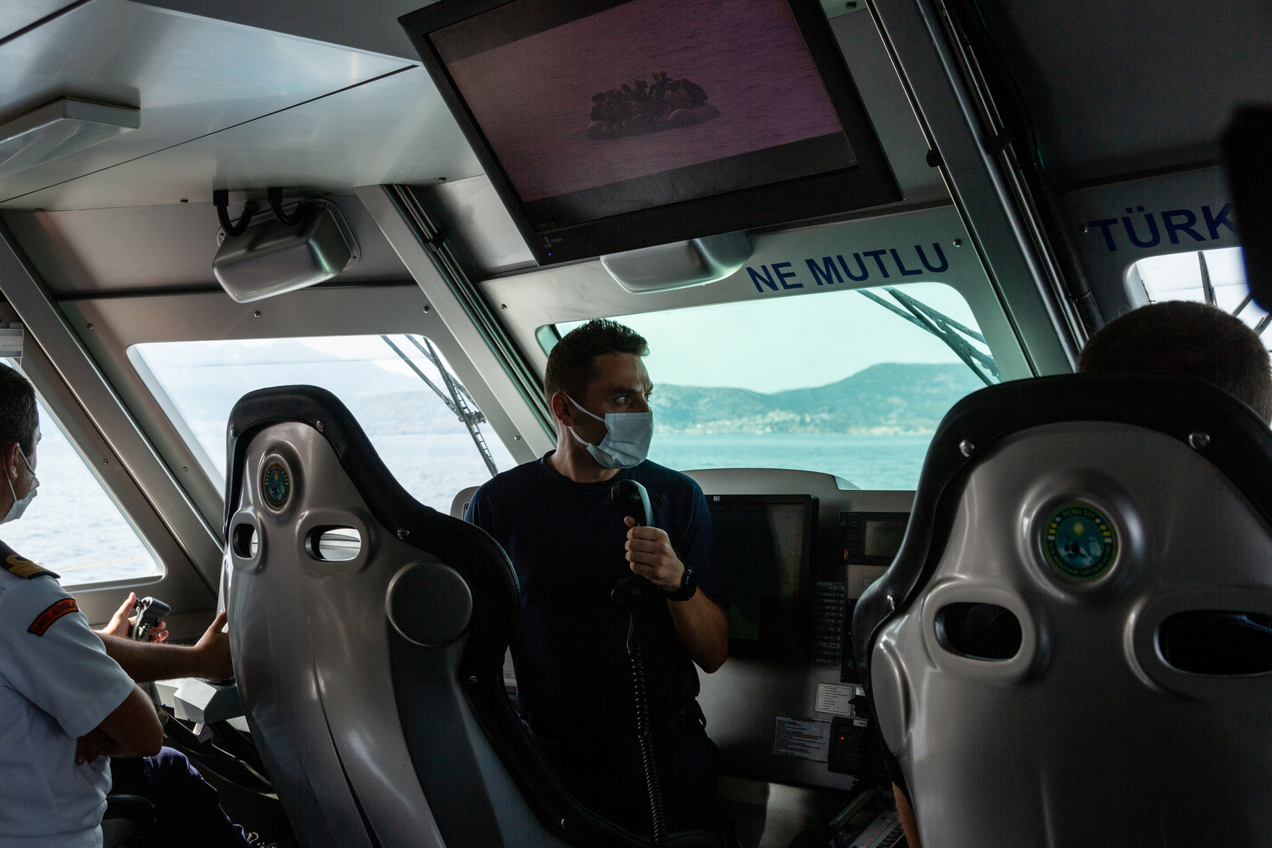 Turkish coastguard staff make a call to the Greek coastguard, informing them of their obligation to rescue a rubber boat of 39 migrants and asylum seekers in Greek waters. The Greek coastguard replied sometime later saying they were in Turkish waters, aft