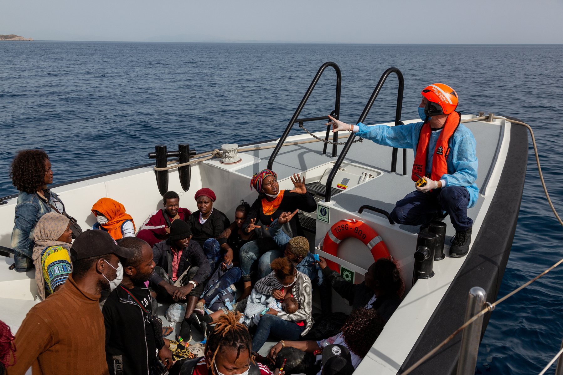 Europe, Turkey, Northern Aegean Sea. 38 migrants and asylum seekers from various sub Saharan African countries on a Turkish Coastguard boat, after being rescued. They were drifting at sea for at least 17 hours, and all claim to have been attacked by Greek