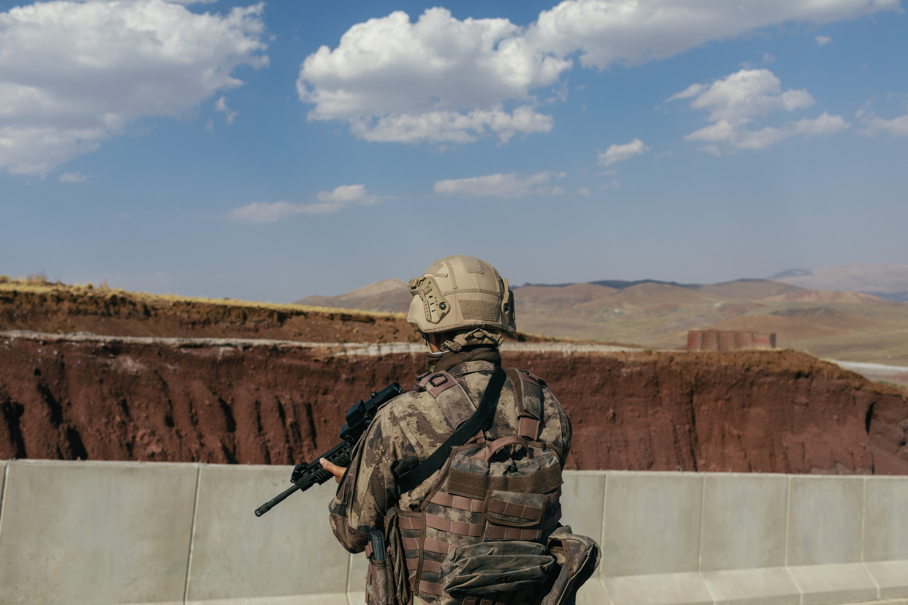 Turkey, Çaldiran. Turkish Jandarma forces operating in the border area with Iran, where they have established a checkpoint on the main roads. A newly constructed border wall seen snaking through the mountains, as an attempt to prevent increasing numbers o