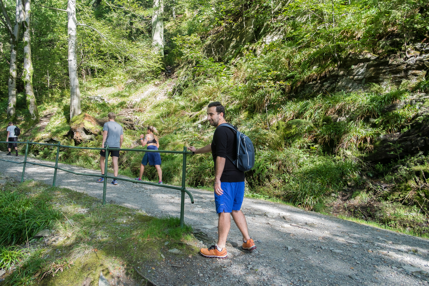 Nader Turkmani waiting for friends as they climb the Fløren mountain surrounding Bergen, Nader's new home after receiving political asylum in the country in early 2016.