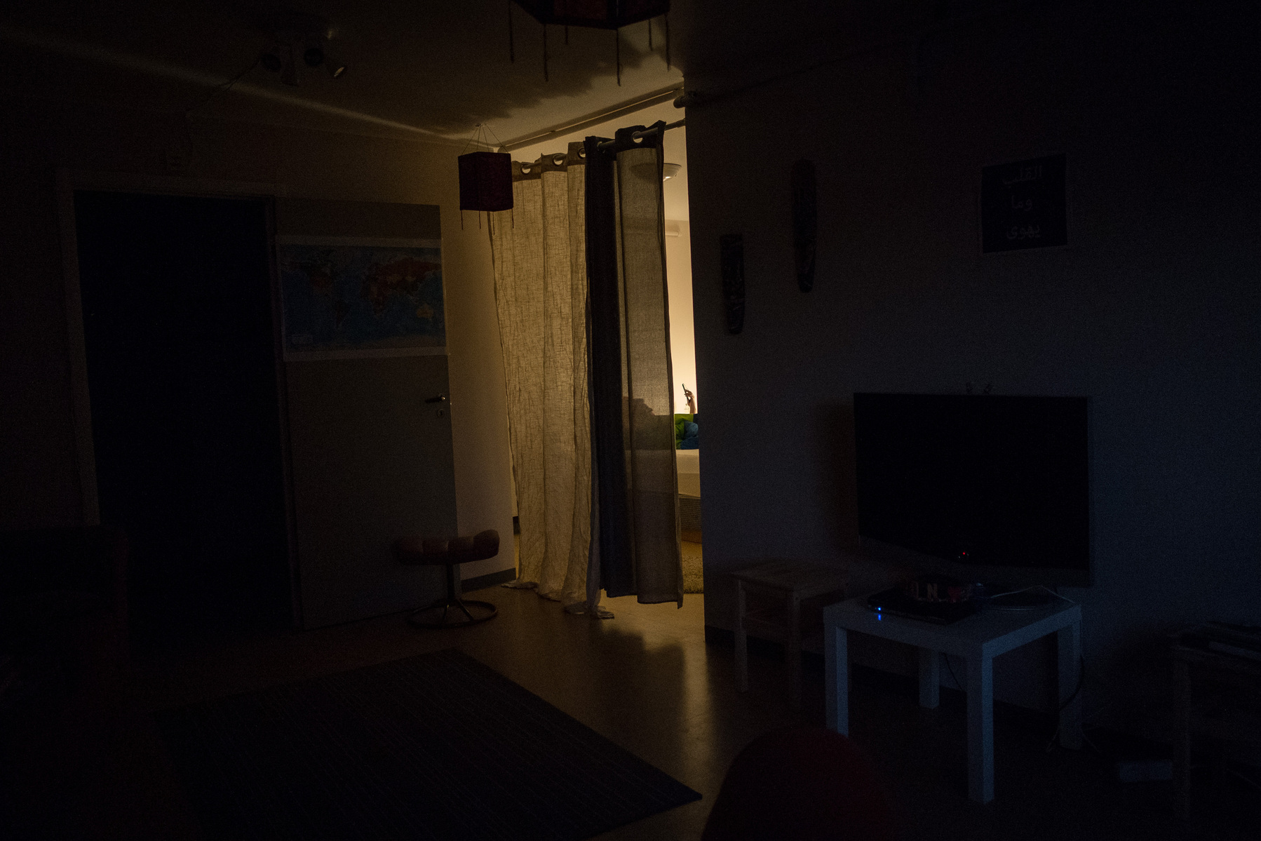 Throughout the night, Nader and Omar talk over the phone, here Nader video chats with Omar from his bed in the early hours of the morning. Omar's ticket was reserved by the IOM, but not purchased, leaving him stranded in Istanbul's main airport. Exhausted