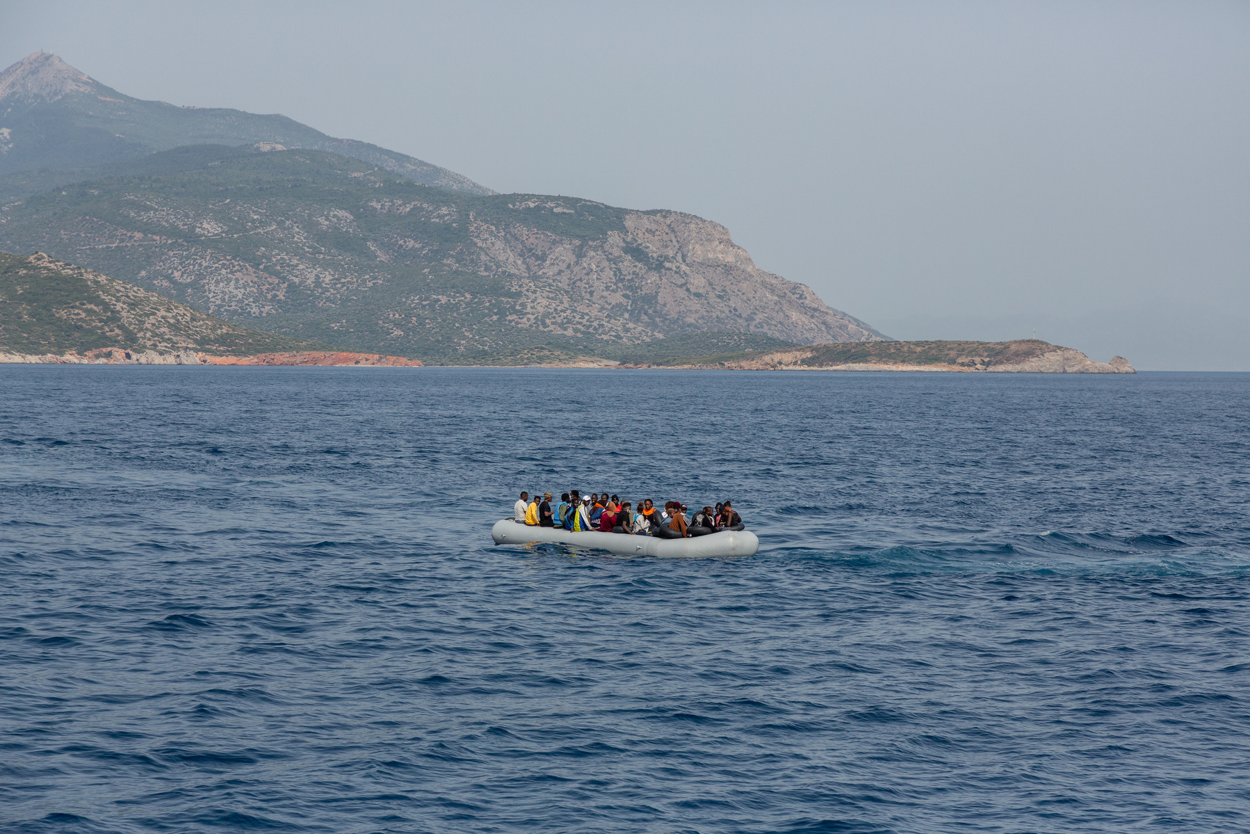 Europe, Turkey, Kuşadası. An engineless rubber boat with 39 persons on board, from multiple sub Saharan African countries has been drifting between Turkish and Greek waters for 17 hours. They all claim to have been pushed back by the Greek coastguard, int