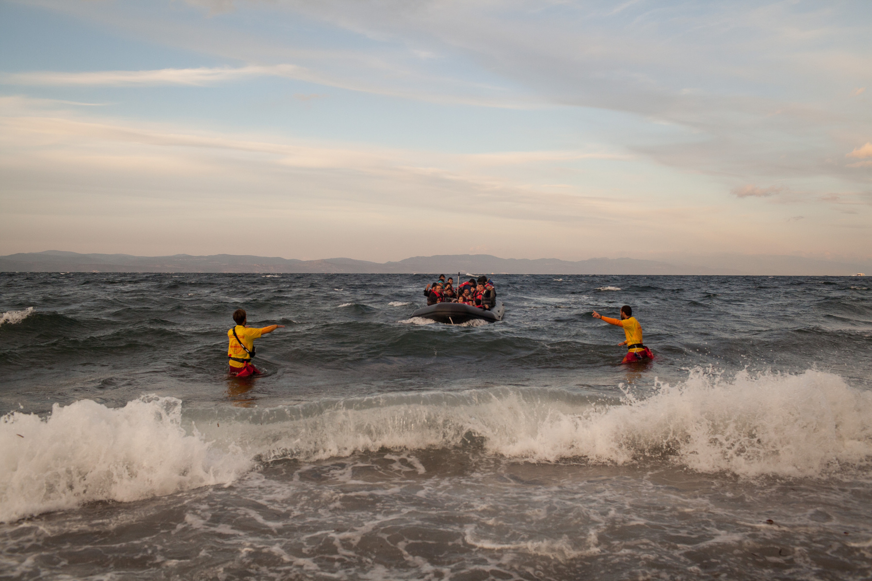 Spanish lifeguards guide a boat of migrants and refugees to land on the Greek island of Lesvos. As many migrants and refugees arrived in Europe in October 2015 as in the whole of 2014.