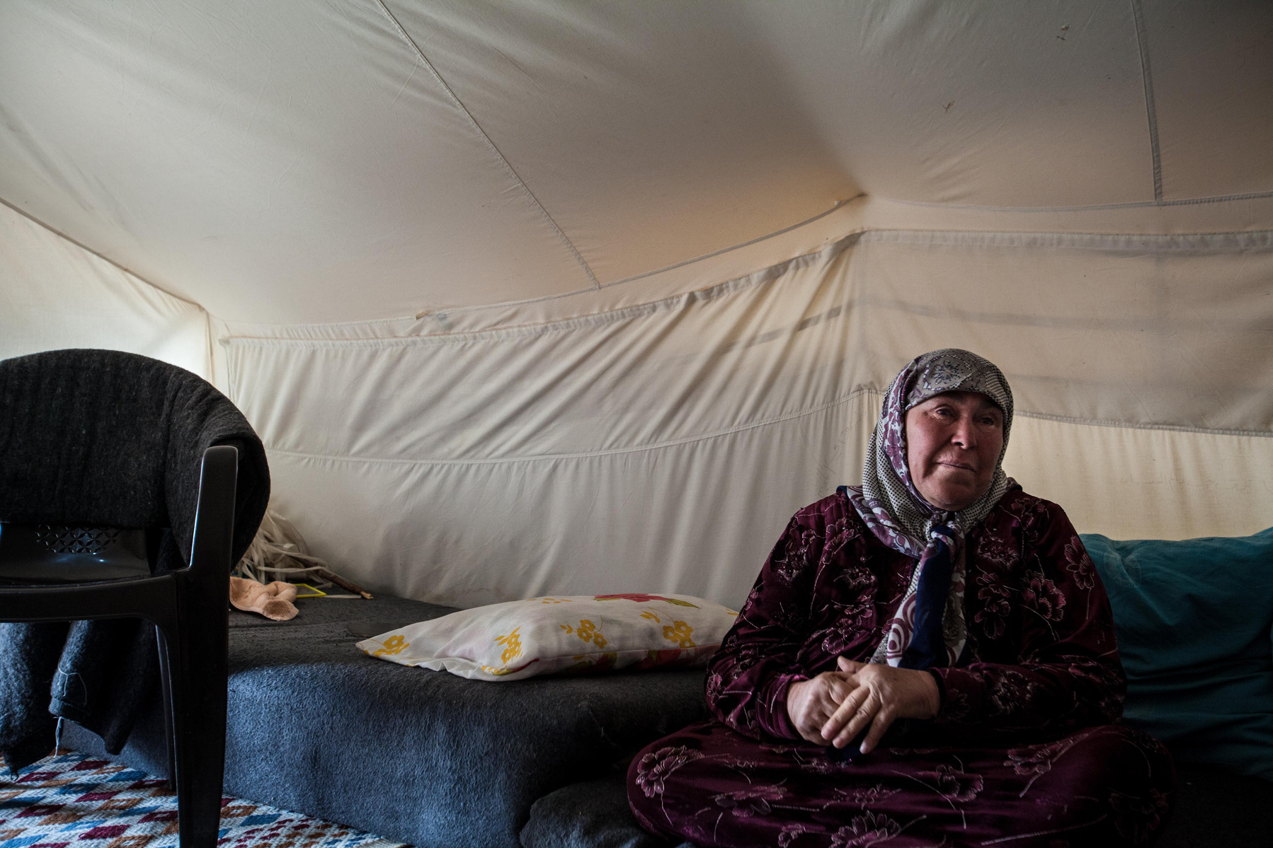 Amina Ghazal from Taftanaz, Idlib province of Syria, cries as the talks about her son killed and home lost in Syria. Islahiye camp, Turkey. 02/01/2013