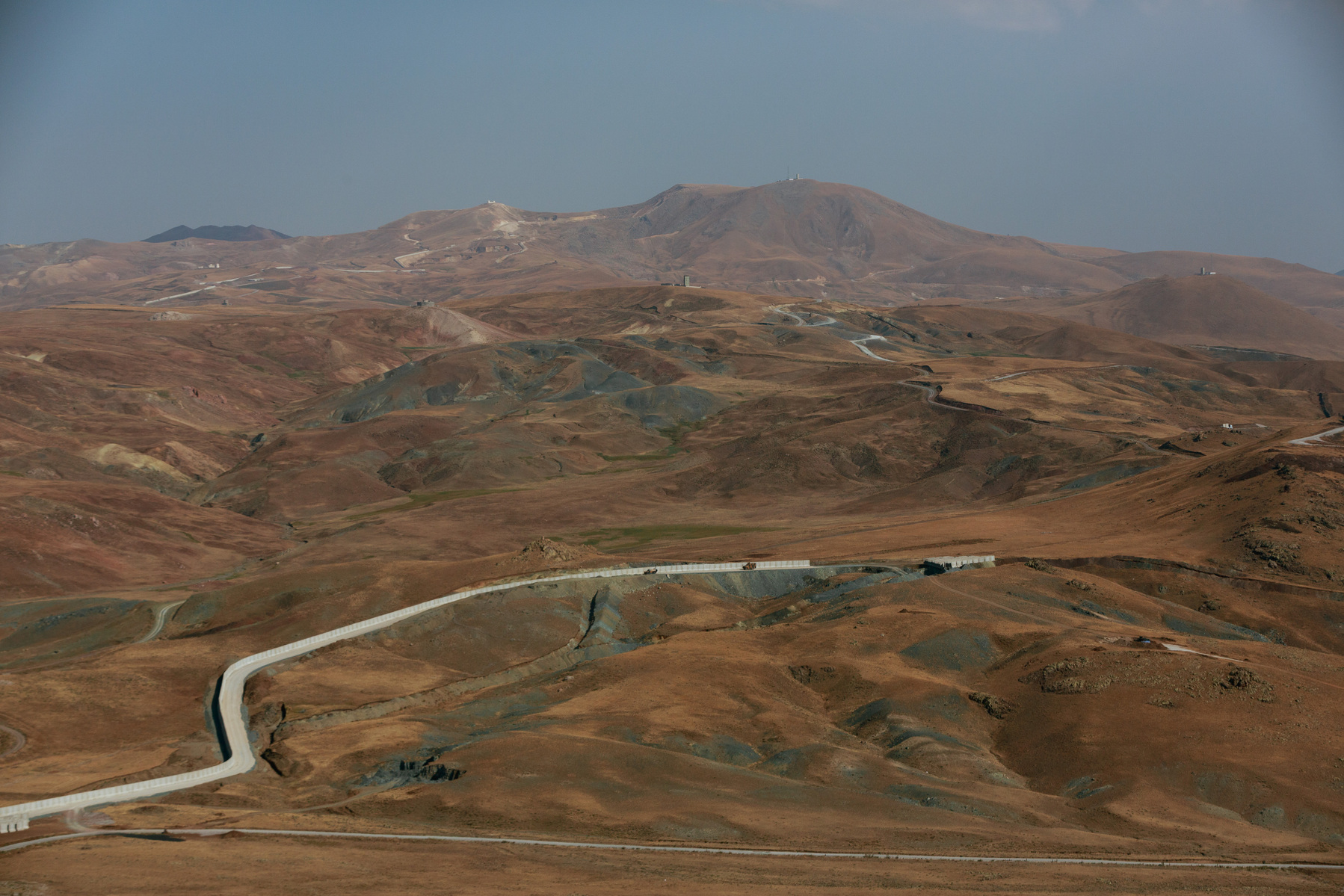 Turkey, Çaldiran. Turkish Jandarma forces operating in the border area with Iran, where they have established a checkpoint on the main roads. A newly constructed border wall seen snaking through the mountains, as an attempt to prevent increasing numbers o