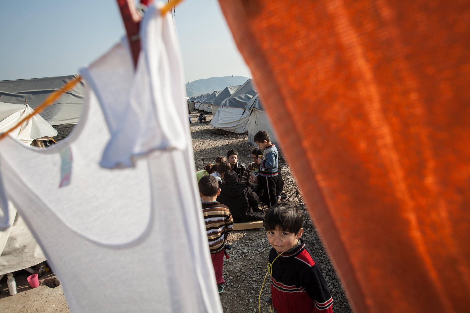 Syrian children play games between the tents at Islahiye refugee camp, southern Turkey. 02/01/2013
