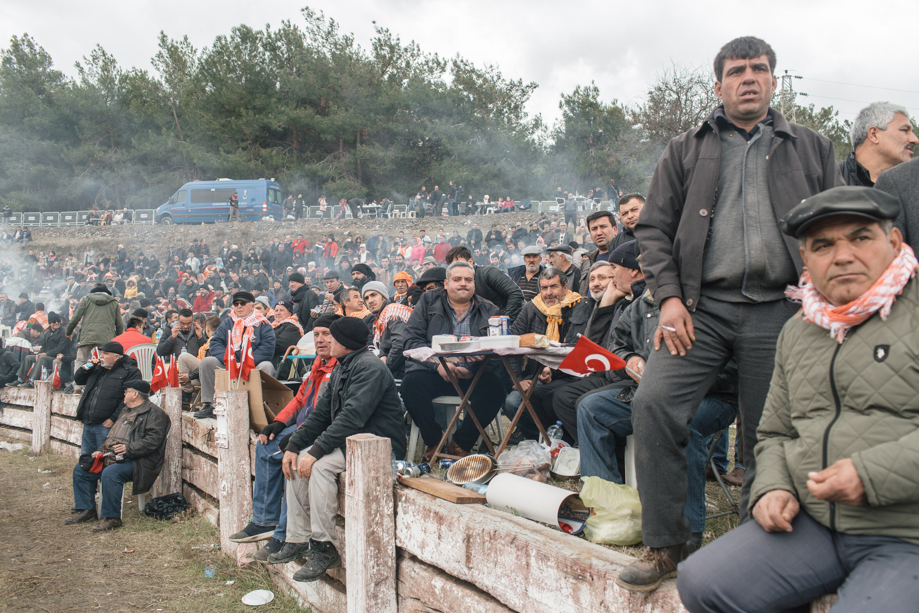 TURKEY, Izmir, Selçuk. Fans watch the 35th annual Selcuk Camel Wrestling Festival competition near Izmir, Turkey. The event usually draws large crowds of upto 20 thousand, although this year the numbers were lower due to recent security concerns and the t
