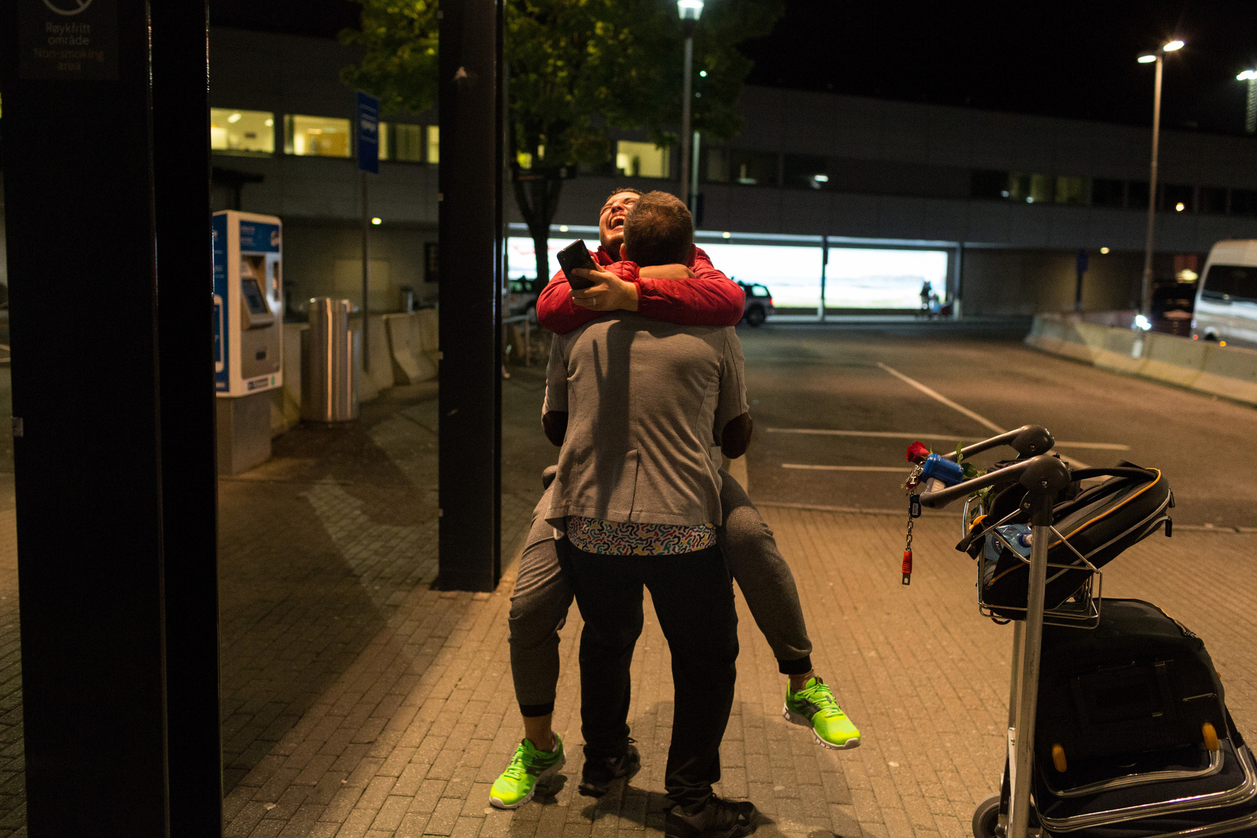 After months apart, Omar (rear) and Nader (foreground) are reunited in Bergen, Norway. Nader proposed to Omar at his birthday party, shortly before being resettled to Norway, at which point it was uncertain as to whether or not Omar would be resettled to