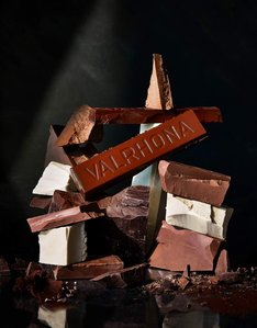 stack of chocolate blocks, white chocolate, milk chocolate, dark chocolate, vahlrona