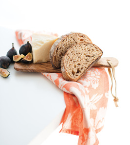 sourdough bread cheese figs in afternoon light