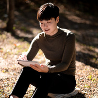 candid headshot of HK young professional in nature