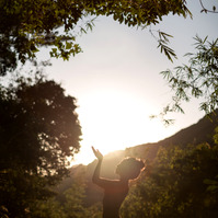 Hong Kong yogi meditating in the mountains