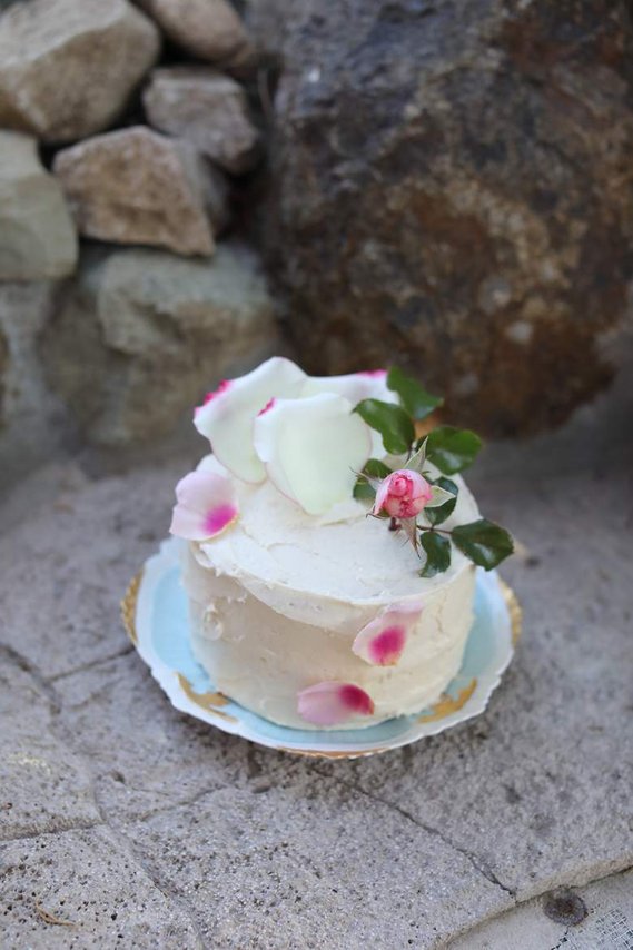 Custom Made Vanilla Olive Oil Cake, decorated with pink roses and baked by local baker Jenefer Taylor