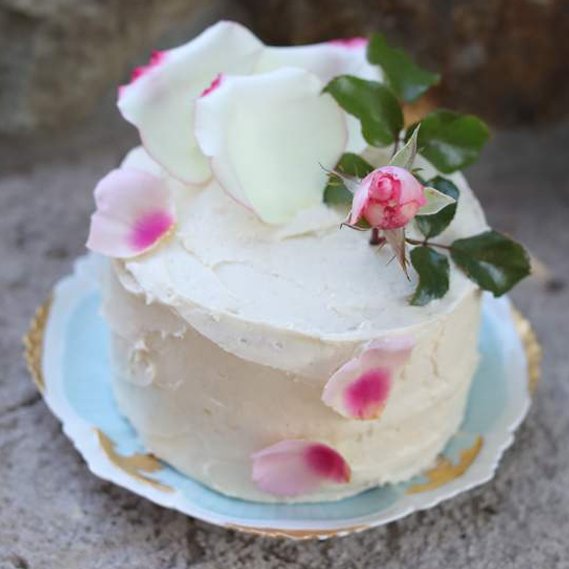 Custom Made Vanilla Olive Oil Cake, decorated with pink roses and baked by local baker Jenefer Taylor