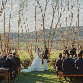 Wedding ceremony at Lion Rock Farm in Sharon, Connecticut, surrounded by rolling countryside and elegant garden landscapes, capturing a romantic and timeless celebration — photographed by a CT-based wedding photographer.