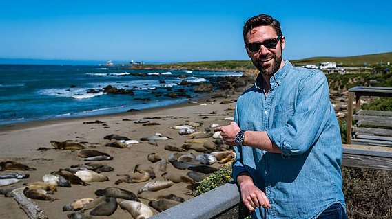 Ned pointing at elephant seals.