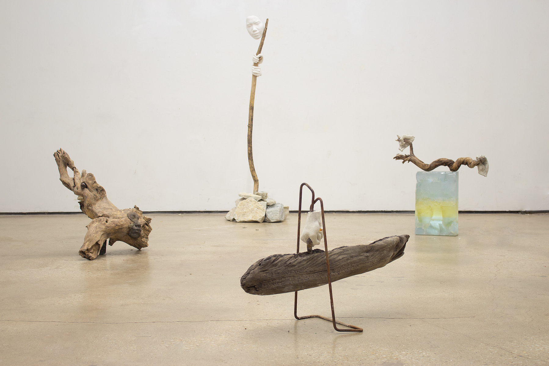 Following the natural "movement" of the found wood, raw material is cast onto it, developing a narrative that unfolds with the title.