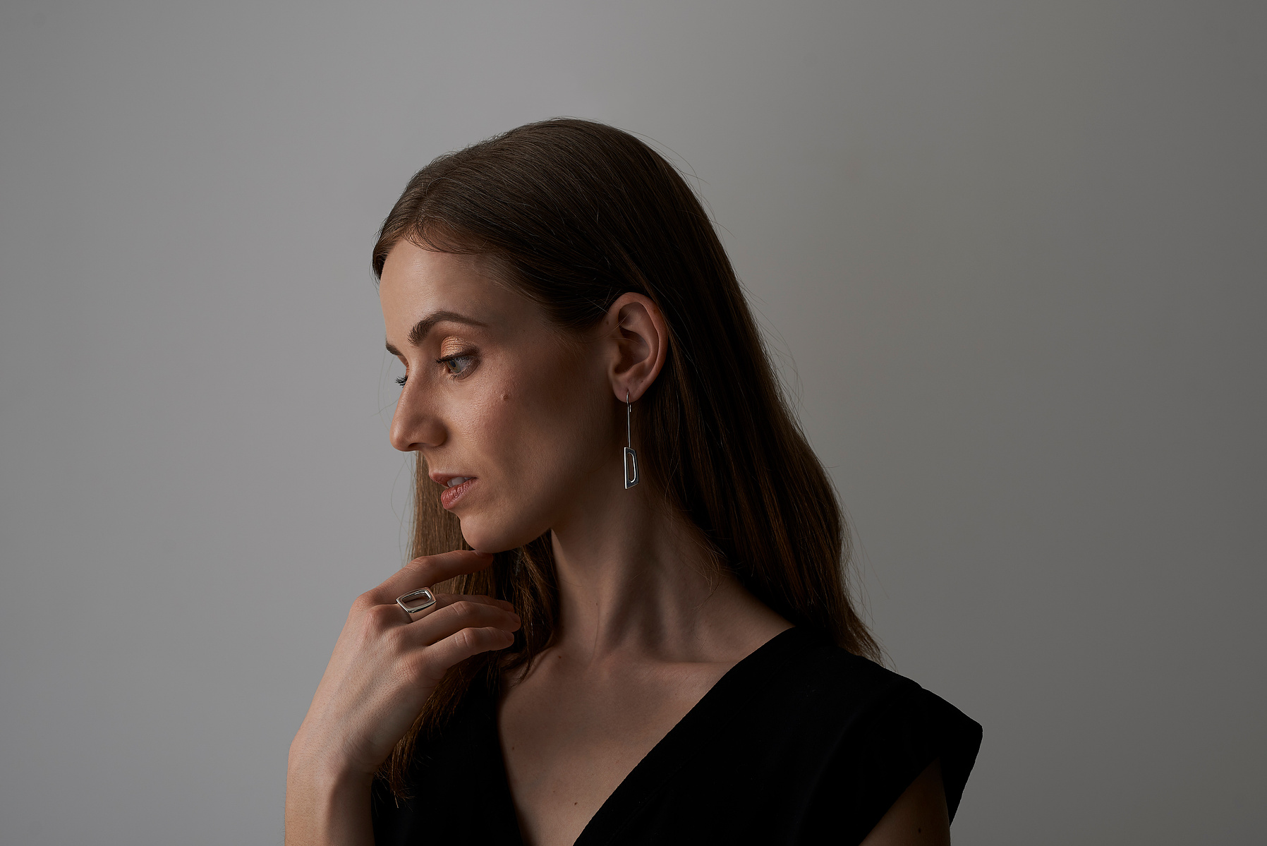 Silver earings worn on model form the Alfonsina series by Eszter Zamori Jewelry