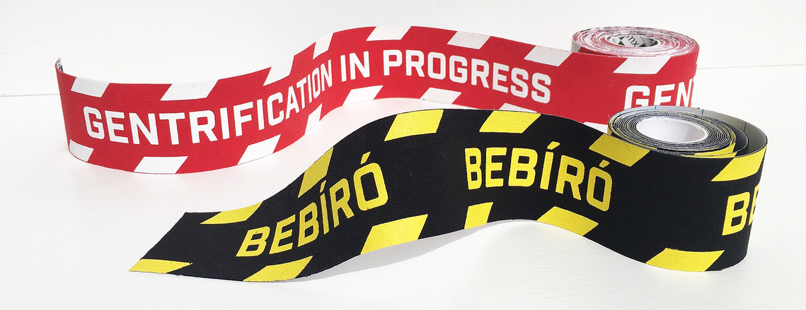 Tape Tattoo texts on them: Gentrification in progress and BEBÍRÓ, made by Eszter Zamori
