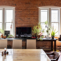 Interior view of photography and videography studio lounge at Enginehouse 27 located in Detroit, MI available for daily rental which includes, grip, lighting, capture cart, camera stand, lounge, generous space.