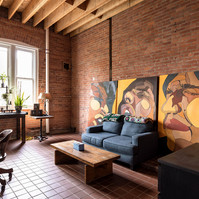 Interior view of photography and videography studio lounge at Enginehouse 27 located in Detroit, MI available for daily rental which includes, grip, lighting, capture cart, camera stand, lounge, generous space.