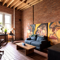 Interior view of photography and videography studio lounge at Enginehouse 27 located in Detroit, MI available for daily rental which includes, grip, lighting, capture cart, camera stand, lounge, generous space.