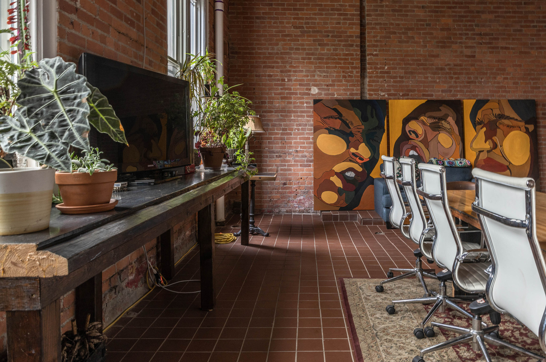 Interior view of photography and videography studio lounge at Enginehouse 27 located in Detroit, MI available for daily rental which includes, grip, lighting, capture cart, camera stand, lounge, generous space.