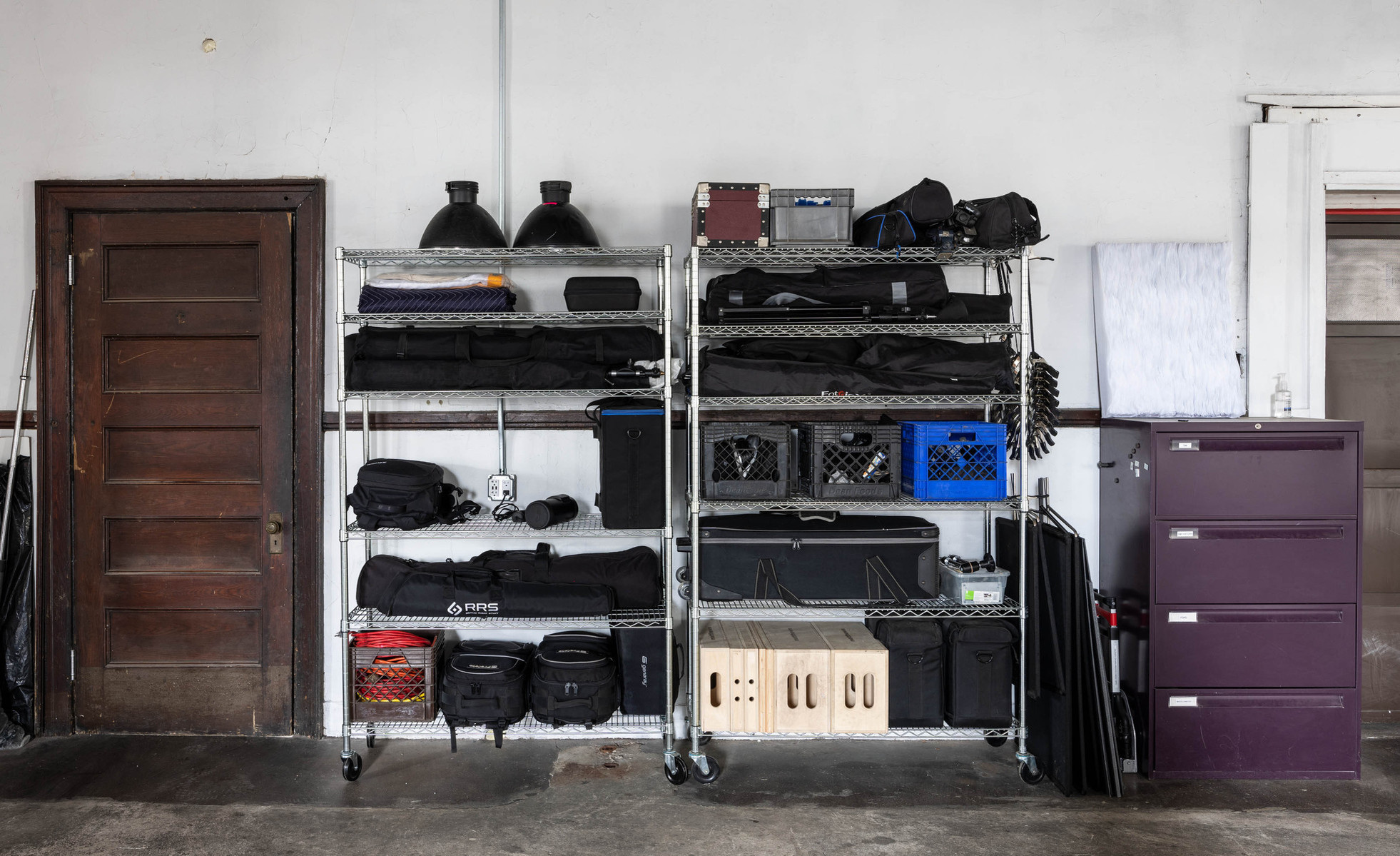Interior view of photography and videography studio Enginehouse 27 located in Detroit, MI available for daily rental which includes, grip, lighting, capture cart, camera stand, lounge, generous space.