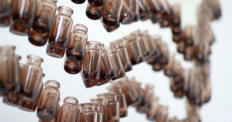Artist Melissa Carey, Sydney Artist, Female Australian Artist,  installation artist Sydney, suspended installation, art installation Sydney, art installation Australia emotions and art, bottle art installation, recycled bottle art