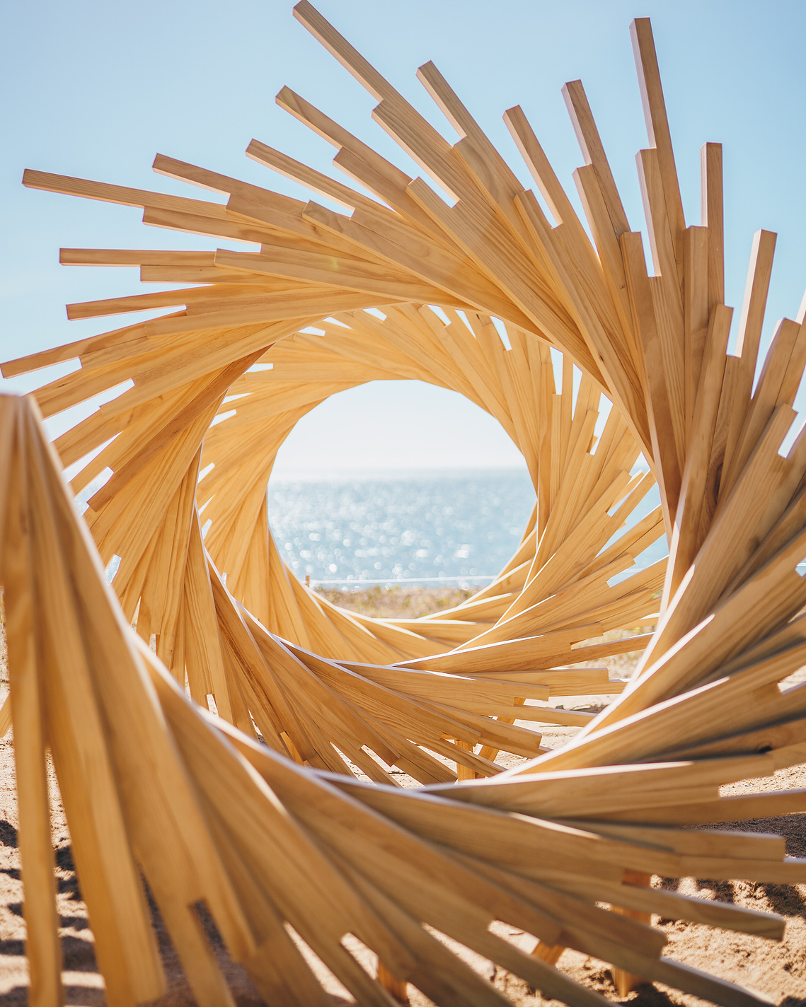 australian installation artist, parametric sculpture, timber helical spiral sculpture, artist Melissa carey, spiral sculpture, timber spiral art, wood spiral art, Australian contemporary artist, Strand ephemera 2019, sculpture festival art