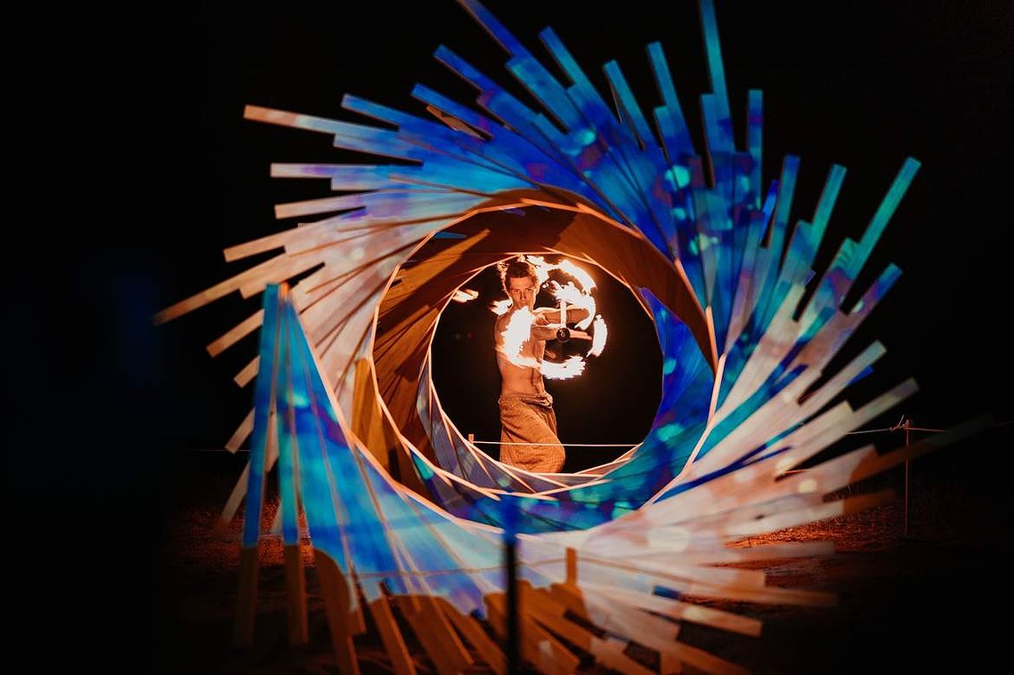 video projection art, parametric sculpture, timber helical spiral sculpture, artist Melissa carey, spiral sculpture, timber spiral art, wood spiral art, Australian contemporary artist, Strand ephemera 2019, sculpture festival art