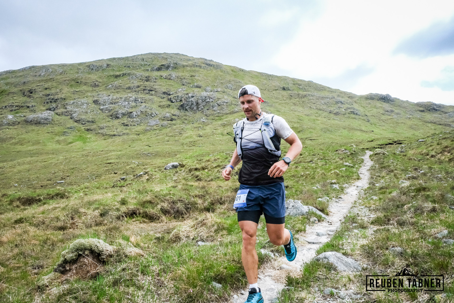 Ludwig Antilli races for camp on the final leg of day one. The first fininisher, but pushed into 2nd place by the day's winner Lewis Taylor who had started in the later wave.