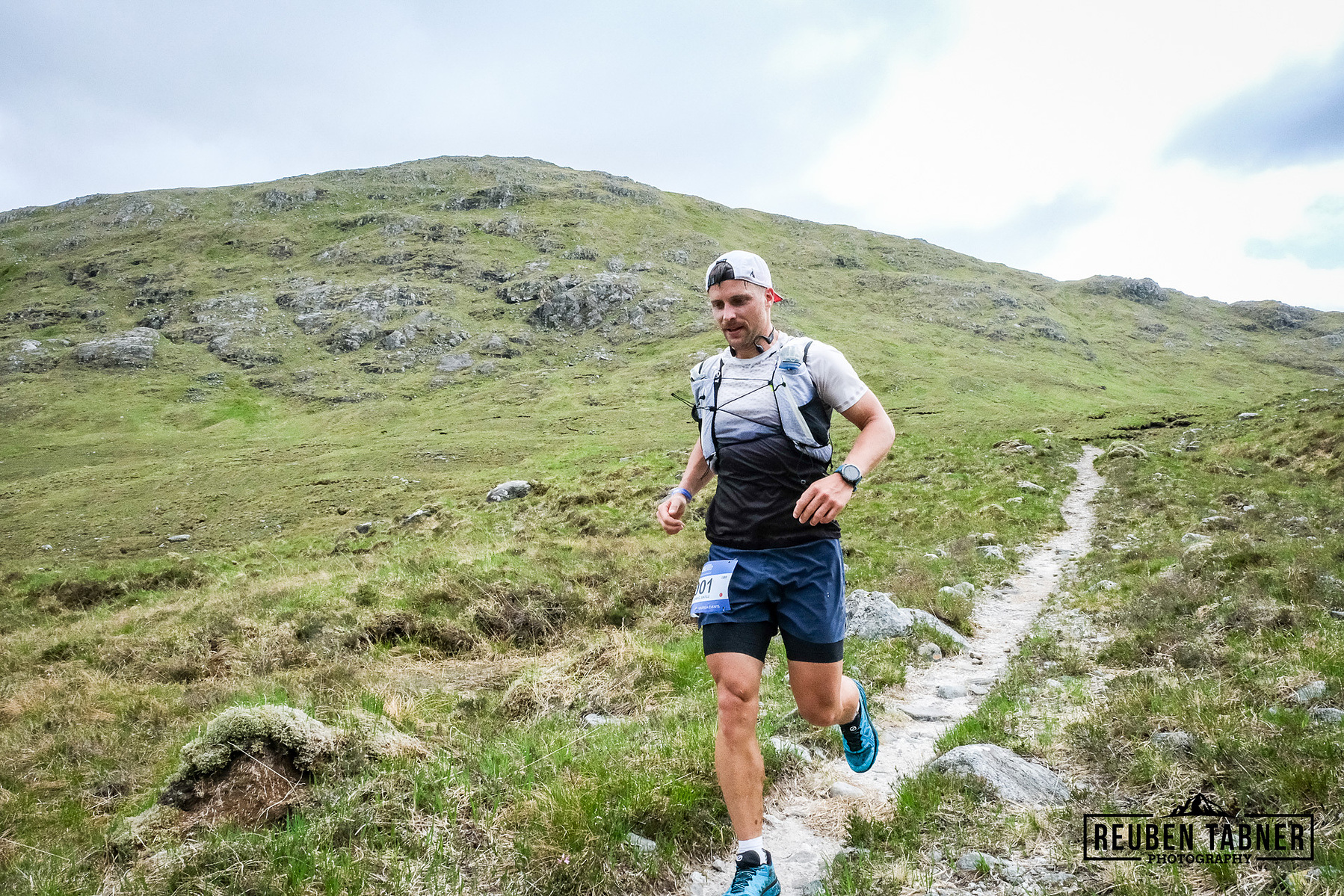 Ludwig Antilli races for camp on the final leg of day one. The first fininisher, but pushed into 2nd place by the day's winner Lewis Taylor who had started in the later wave.