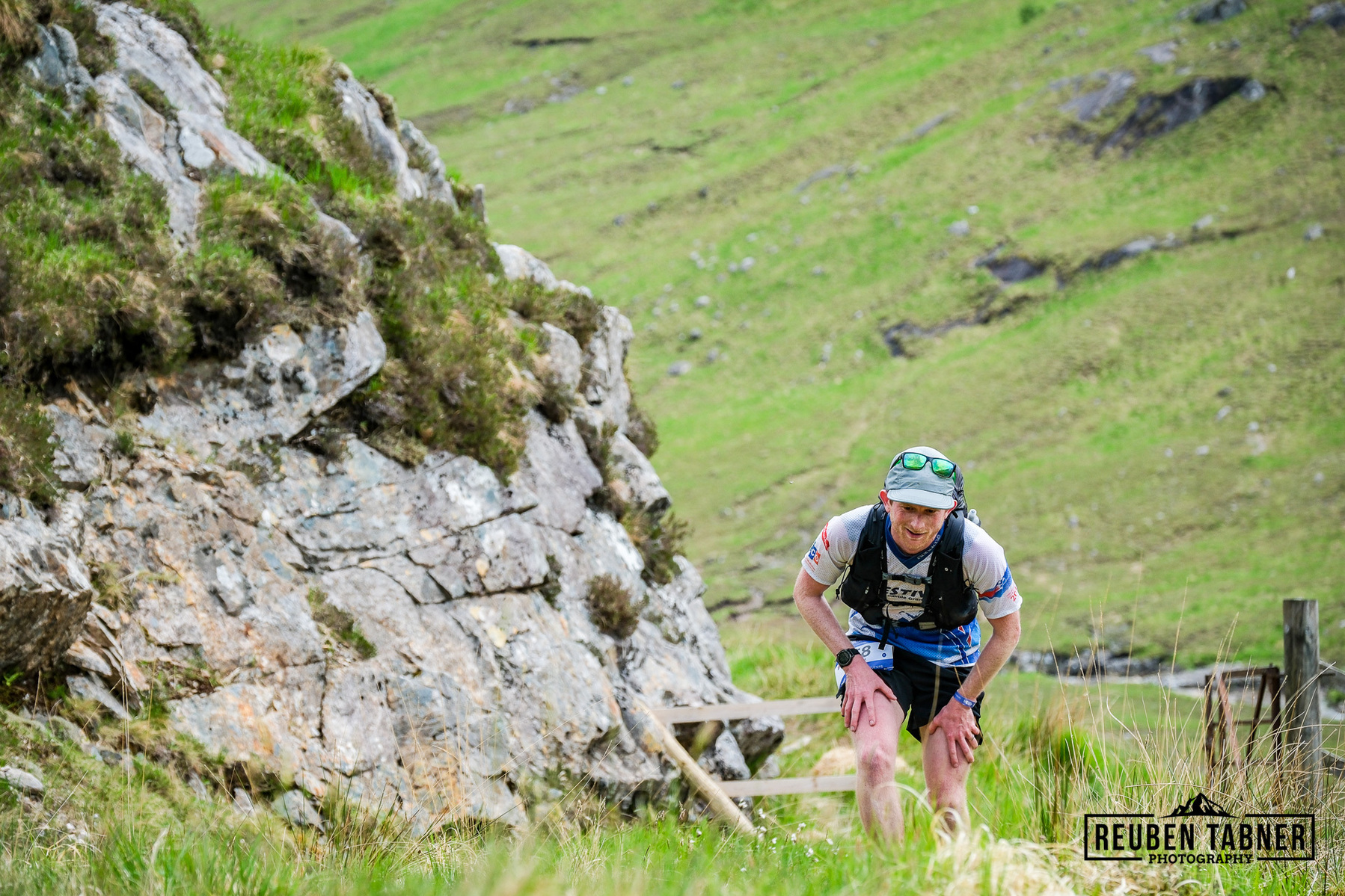Lewis Taylor tops out at the top of Glen Cona and heads home to take the lead in 3:05:15 at the end of day one.