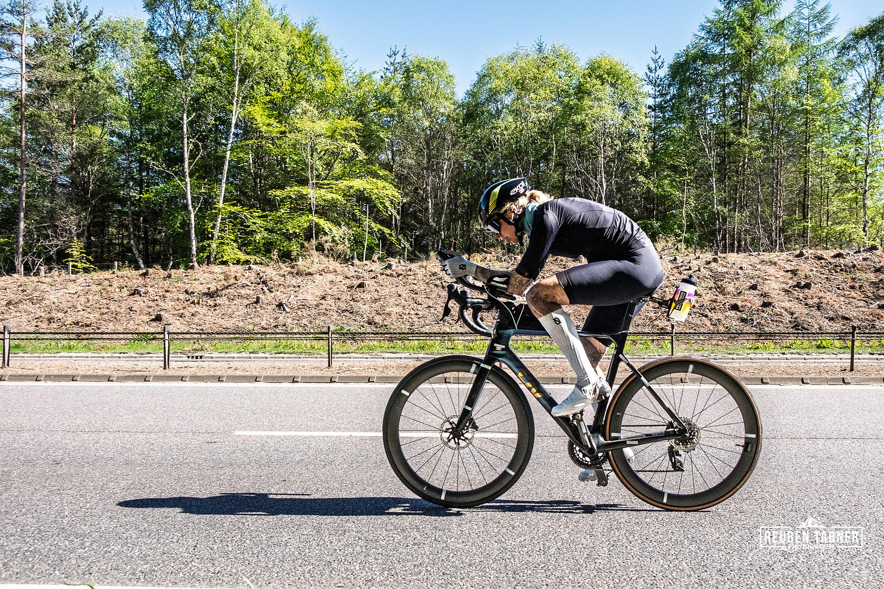 Dr Sarah Ruggins powering uphill in the Scottish Highlands, mid-way through her 2,700km endurance ride