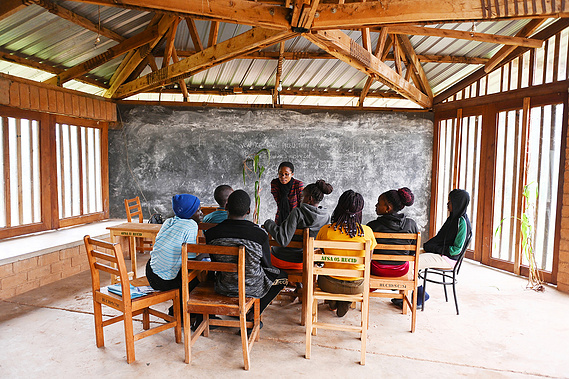 Students at the regenerative college RUCID learning practical farming skills.