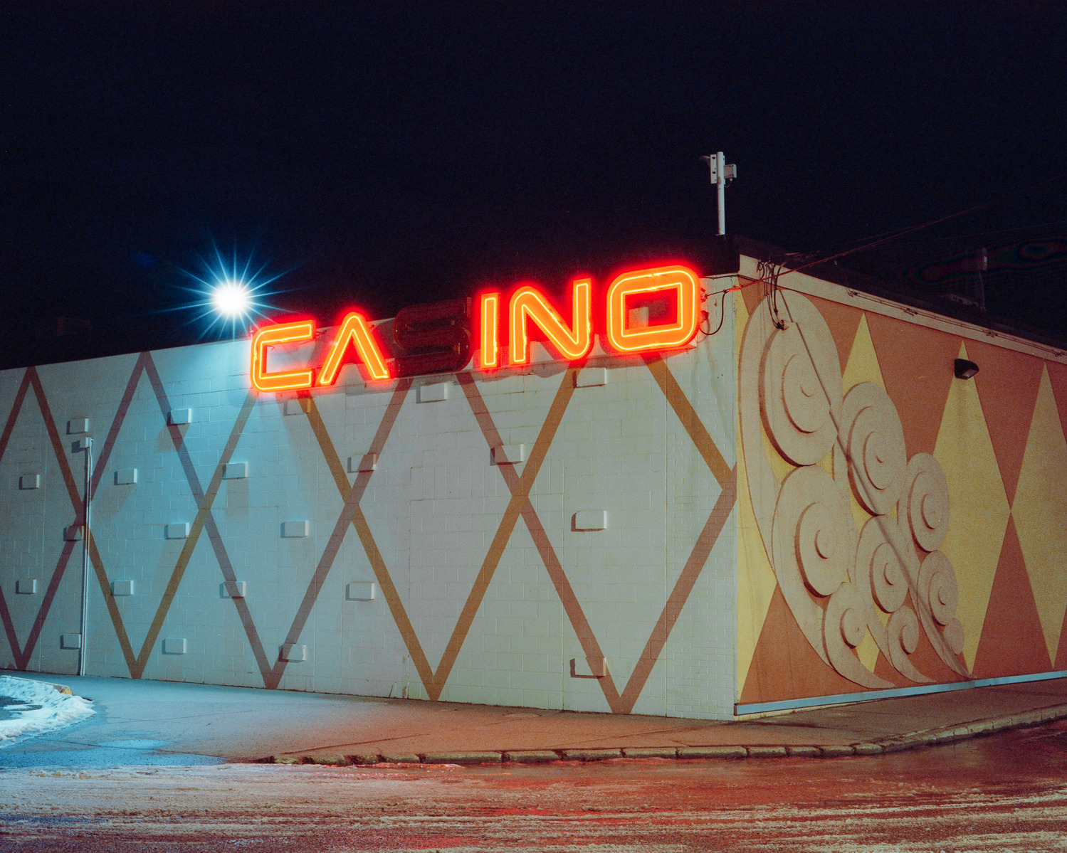 Cameron Eng shooting Cinestill 800T 120 film on my medium format film camera Pentax 67. Night time photography in Calgary. All photos by Cam Eng