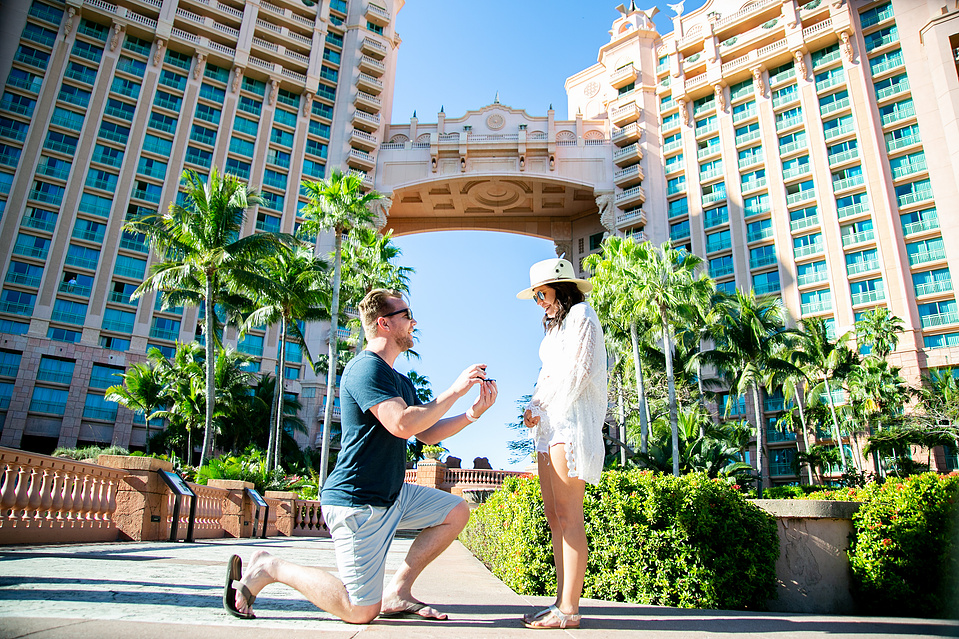 Young Man proposing on Bended Knee at Atlantis Paradise Island, Nassau Bahamas.