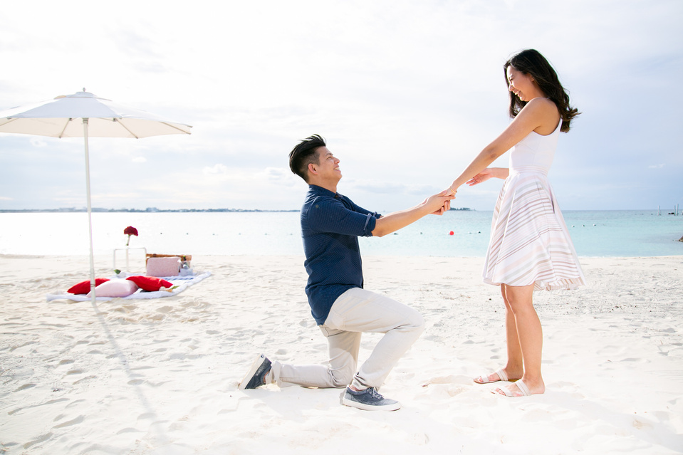 Young Man proposing on Bended Knee at Grand Hyatt Baha Mar, Bahamas.
