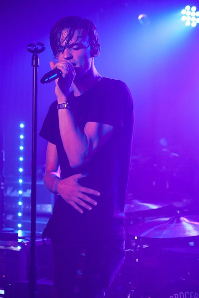 Expressive gestures and movements frozen in captivating rock portraits. Arlene's Grocery.