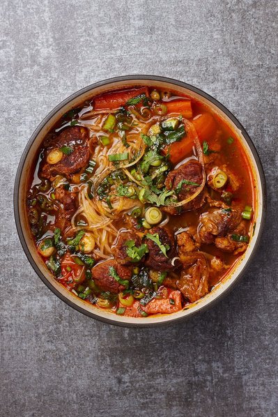 Styled promotional photo of to-go meals for NYC delivery app.
